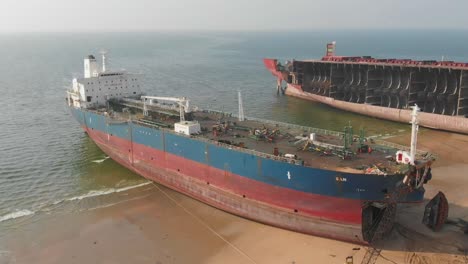 Aerial-View-Of-Beached-Tanker-Ship-At-Beach-At-Gaddani-In-Pakistan