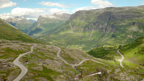 Bird's-Eye-View-Of-Winding-Road-From-Eidsdal-To-Geiranger-With-Scenic-View-Of-Mountains-In-Norway
