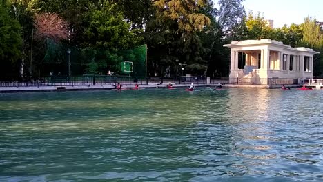 Shot-of-a-game-of-kayak-polo-in-the-big-pond-at-Retiro-parl,-Madrid