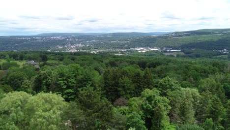 A-drone-shot-of-the-the-valley-and-town-of-Ithaca-New-York