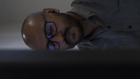 Ethnic-Minority-Office-Male-Wearing-Glasses-Browsing-On-Computer