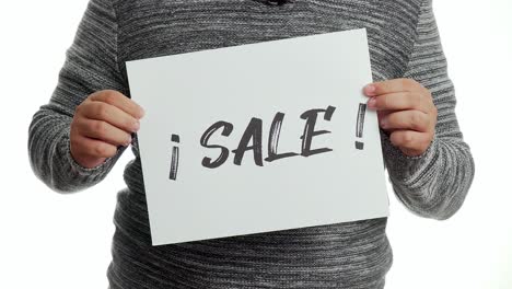 A-person-holding-a-sign-with-the-message-and-the-word-"sale