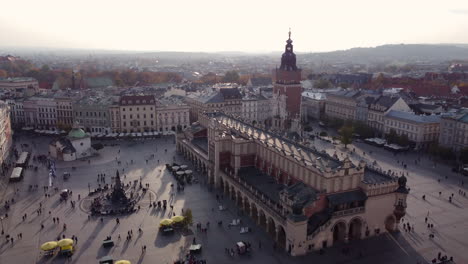 Main-Market-Square-With-Cloth-Hall-And-Town-Hall-Tower-In-Krakow-City,-Poland
