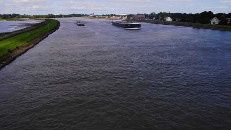 Aerial-Over-River-Noord-With-VT-Vorstenbosch-Approaching-In-Background