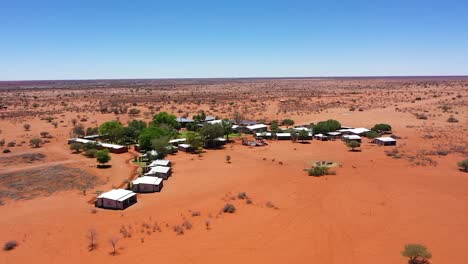 Drone-Shot-of-a-Lodge-in-Namibia-with-some-trees-in-the-middle-of-nowhere