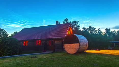 People-living-inside-Wooden-Cottage-with-Barrel-Sauna-during-holiday-trip---Blue-sky-with-flying-clouds---Vibrant-constrast-colors-of-time-lapse-footage