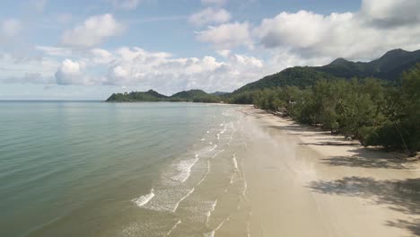low-angle-aerial-drone-view-of-tropical-beach-on-Koh-Chang-Island-in-Thailand
