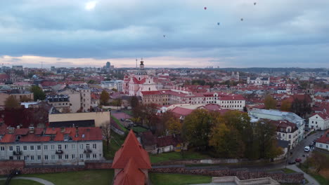 View-From-The-Bastion-Of-Hot-Air-Balloons-In-Flight-Over-Old-Town-Of-Vilnius-In-Lithuania-With-Church-Of-St