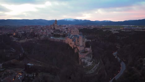 Aerial-view-of-Segovia-Alcazar-and-city-during-sunrise-in-winter-cold-morning
