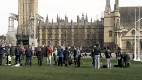 People-And-Camera-Crews-Getting-Ready-On-Parliament-Square-Garden-On-17-March-2022