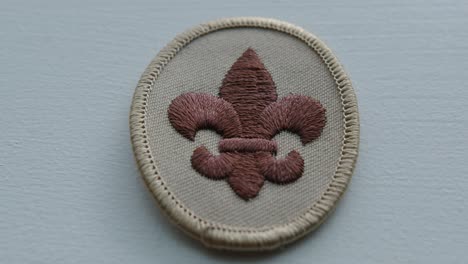 Close-Up-Pan-Right-of-a-Boy-Scout-Arm-Patch