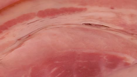 Macro-shot-of-boiled-ham-slice,-close-up-view-in-4k