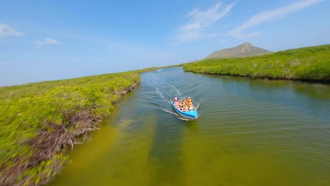People-bathing-in-green-waters-of-El-Morro-National-Park,-Montecristi-in-Dominican-Republic