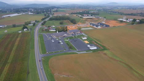 Aerial-shot-of-a-church-in-Virginia-with-a-new-subdivision-being-built-in-the-background