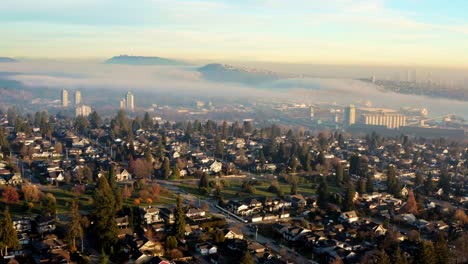 Expansive-Municipality-Of-North-Vancouver-In-British-Columbia,-Canada-With-Visual-Of-The-Prominent-Lions-Gate-Hospital-On-A-Foggy-Day