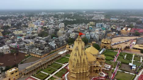 Aerial-rotating-drone-shot-of-Somnath-temple-and-city