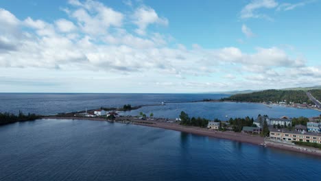 Drone-shot-of-the-harbor-in-Grand-Marais-in-the-summer-on-a-sunny-day