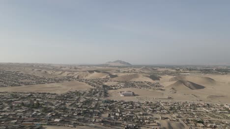 Aerial-desert-flyover-of-Ica-Peru-and-endless-surrounding-sand-dunes