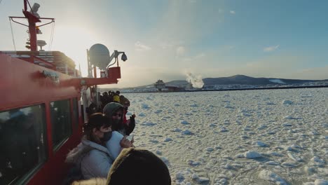 Passengers-Taking-Photos-Of-Drift-Sea-Ice-Onboard-Garinko-Go-II-Cruise-Ship-During-Sunset