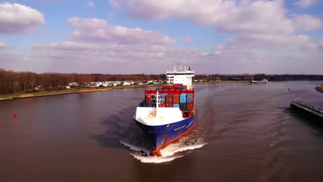 Aerial-Forward-Bow-View-Of-WEC-de-Hoogh-Cargo-Ship-Along-Oude-Maas
