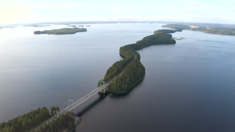 Aerial-view-of-flying-above-a-long-and-narrow-island-in-Finland
