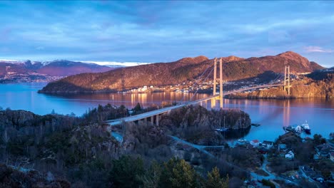 Day-to-night-time-lapse-transition-view-from-Stongafjellet-towards-Askoybroen,-The-Askoy-Bridge