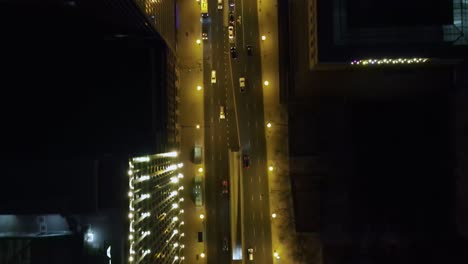 Aerial-view-above-the-West-Kinzie-street-in-downtown-Chicago,-during-nighttime---birds-eye,-drone-shot