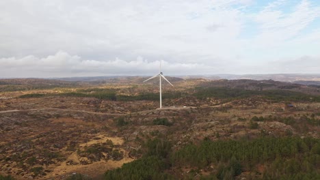 One-wind-turbine-producing-electricity-in-Lindesnes-windfarm-Norway---Aerial-showing-turbine-operated-by-Asko-Fornybar-AS-in-southern-Norway---Aerial