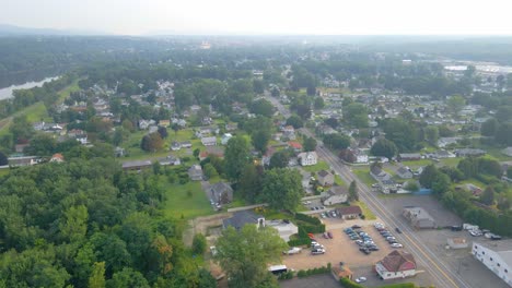 Aerial-fly-over-a-suburban-downtown-outskirt-are-in-America