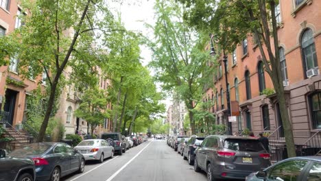 First-Person-POV-Walking-Down-Urban-Street-in-New-York-City-on-Beautiful-Summer-Day