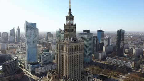 Aerial-view-around-the-The-Palace-of-Culture-and-Science,-in-sunny-Warsaw,-Poland---orbit,-drone-shot
