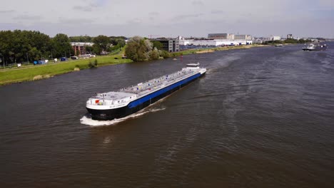 Aerial-View-Off-Forward-Bow-Of-LNG-Tanker-Blue-Christina-Port-Side-Travelling-Along-Oude-Maas