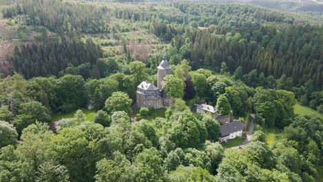 drone-footage-of-Wildenburg-Castle-in-the-southeast-of-the-village-of-Friesenhagen-in-the-North-Rhine-Westphalia-region-of-Germany