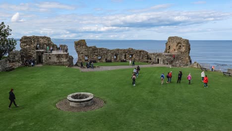 Courtyard-of-Saint-Andrews-Castle-with-tourists-visiting-the-landmark
