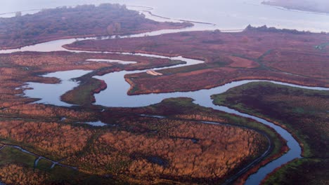 Aerial-panoramic-view-over-river-delta-landscape-in-The-Netherlands,-Europe