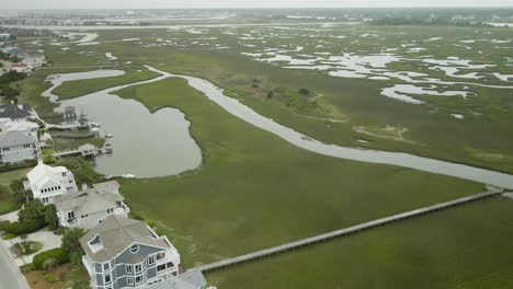 Properties-by-Shell-Island-Resort-Wrightsville-Beach,-Aerial-over-pier