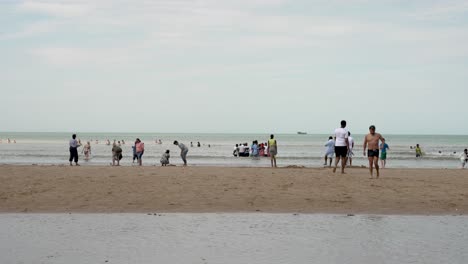 People-Walking-On-Beach-And-In-The-Waters-In-The-Bay-At-Margate-Beach-On-23-July-2022