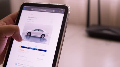 Browsing-an-online-marketplace-for-used-cars-on-the-Cars24-website