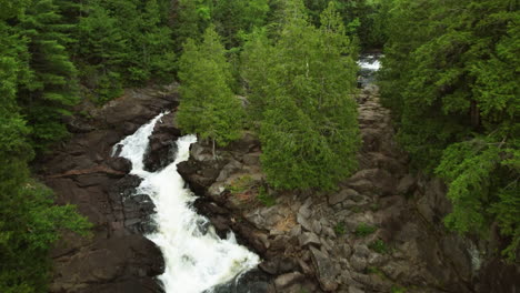 aerial-drone-of-Oxtongue-Falls-at-Algonquin-Park,-Ontario,-Canada