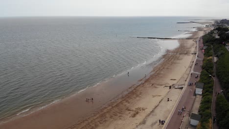 Fast-drone-footage-of-the-beach-in-Clacton-on-a-sunny-day