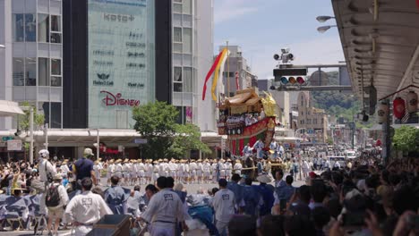 Gion-Matsuri-Final-Day,-Japanese-Men-Pull-Rope-to-Move-Yamaboko-Through-Street
