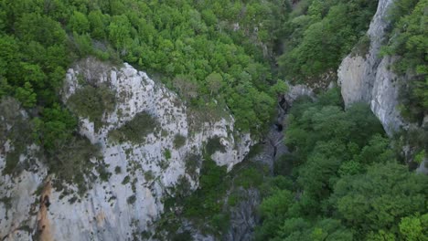 aerial-drone-view-of-cliff-near-Albanian-canyon-"Syri-i-ciklopit