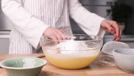Baker-Preparing-Ingredient-Mix-for-Carrot-Cake-Batter---Slider-Left