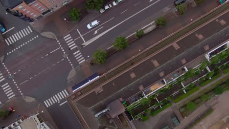 Living-buildings-and-city-street-in-top-down-drone-view