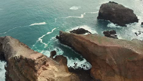 Aerial-view-of-Madeira-Sao-Laurenco-red-rocks-and-ocean-waves