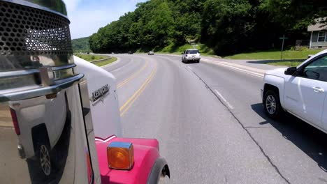 Truck,-Trucker,-Truck-on-road-in-passing-lane-looking-down-at-roadway-from-passenger-side-door