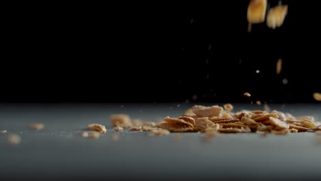 Candied-almonds-fall-on-a-table-in-slow-motion