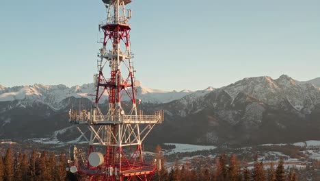 Zakopane-Gubalowka-Transmitter-Tower-With-Snowy-Mountain-In-Background-At-Zakopane,-Poland
