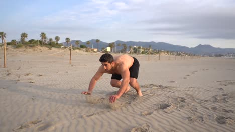 resistance-training-doing-the-frog-jump-on-the-beach