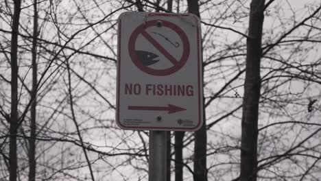 No Fishing Sign Posted At A Public Park Image Of Hook And Fish